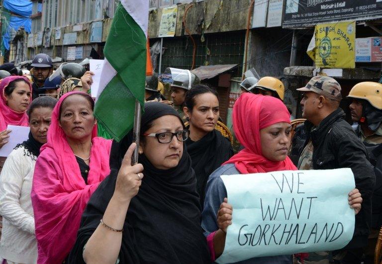 Protesters take part in a rally in support of a separate state of Gorkhaland in Darjeeling on June 18, 2017.