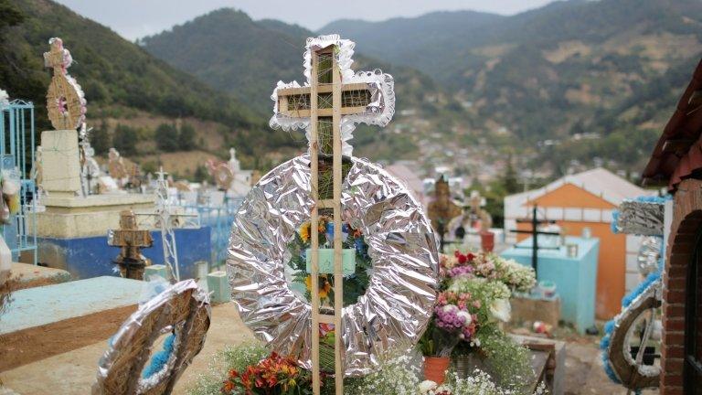 A view of the grave of Raul Hernandez, a tour guide working at a famous butterfly reserve in the western state of Michoacan, Mexico