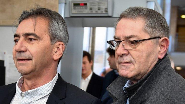 Pascal Fauret (R) and Bruno Odos, respectively pilot and co-pilot arrive on February 18, 2019 at the Assize Court of Aix-En-Provence