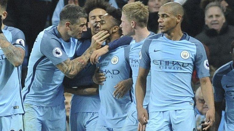 Raheem Sterling (centre) celebrates