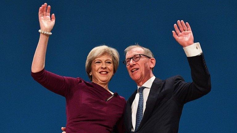 Theresa May and her husband Philip after the speech