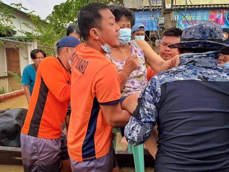 In the Philippines, search and rescue efforts are ongoing for people trapped by floodwaters