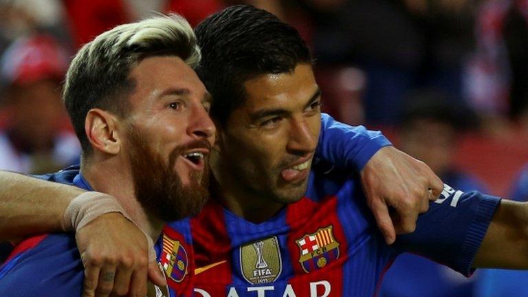 Lionel Messi (left) and Luis Suarez