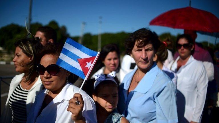 People wait to pay their last respects to Cuban revolutionary icon Fidel Castro at Revolution square in Havana, on November 28, 2016.