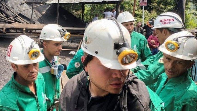 Workers from the National Mining Agency gather outside a mine after an explosion in Zulia, Colombia June 2, 2022. Picture taken June 2, 2022.