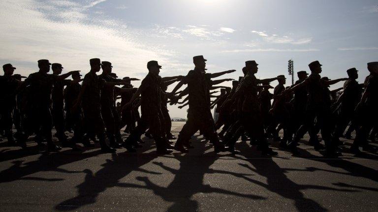 Air Force troops which will provide security for the Games march during a presentation for the press at Galeo Air Base, in Rio de Janeiro (15/07/2016)