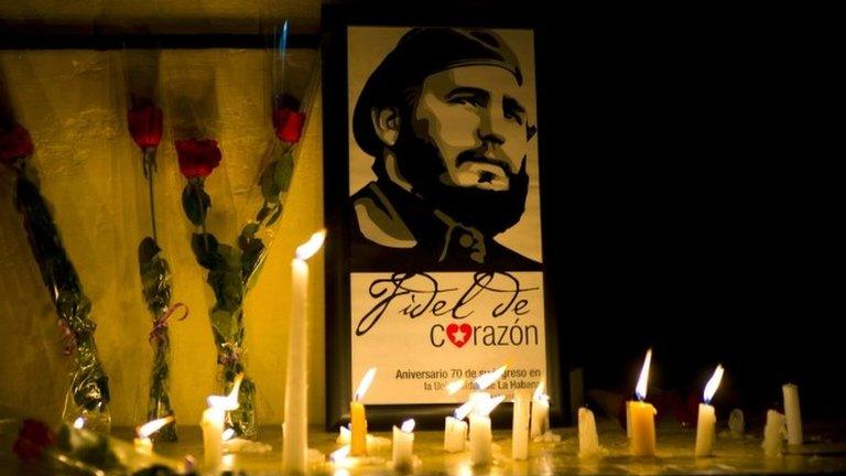 Candles and flowers around a picture of Fidel Castro in Havana. Photo: 26 November 2016