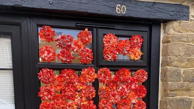 A close up of the flowers decorating the Institute's front door.