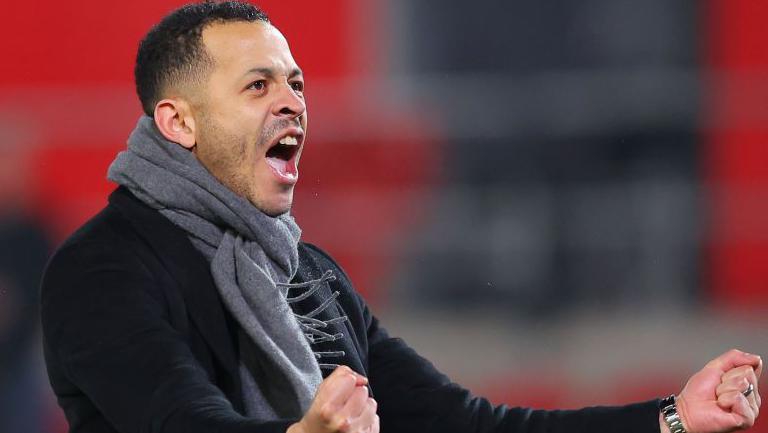 Liam Rosenior celebrates a victory while managing Hull City