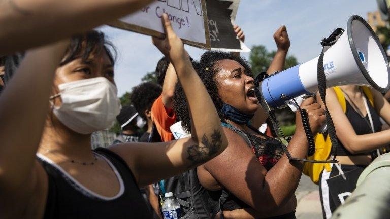 People march during a protest near the White House