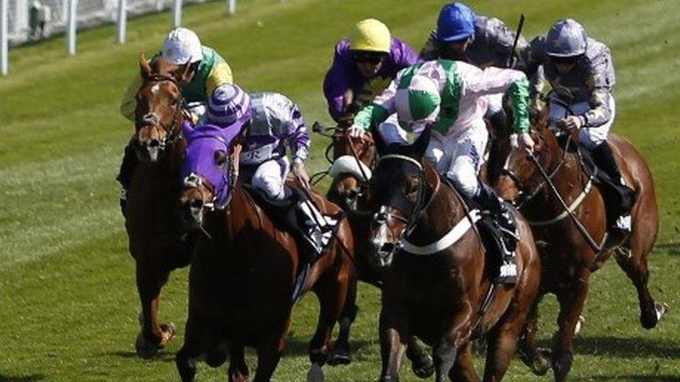 Jamie Spencer (pink) wins the Chester Cup on No Heretic