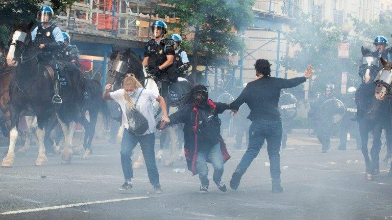 Protestors are tear gassed as the police disperse them near the White House