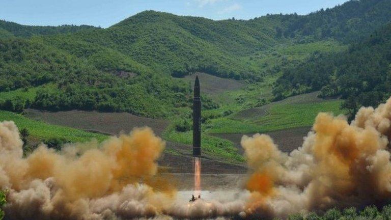 North Korea launches a Hwasong-14 missile, according to its KCNA news agency, in a photo dated 4 July, 2017