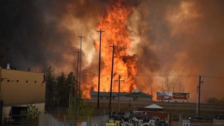 Flames rise in Fort McMurray, Canada. Photo: 3 May 2016