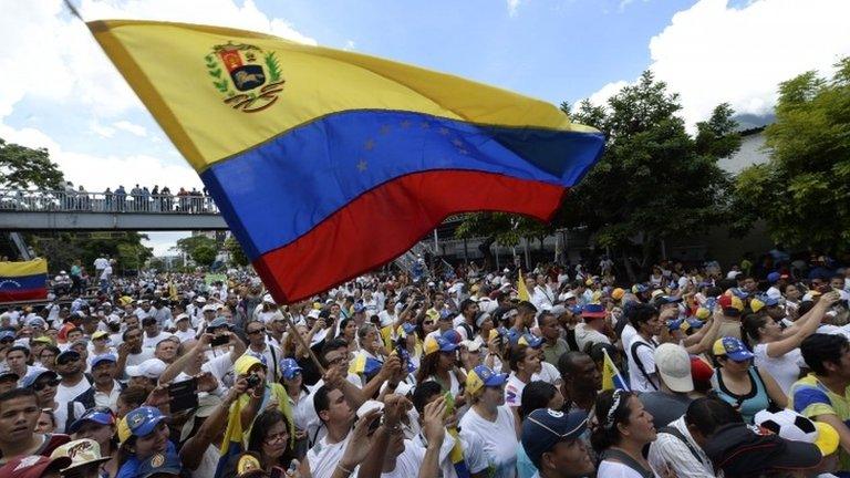 Opponents to Venezuelan President Nicolas Maduro march during a rally in Caracas on September 1, 2016.