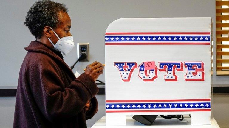 Ruby Lenora casts her in-person vote on her 73rd birthday at a polling site in Milwaukee, US October 20, 2020