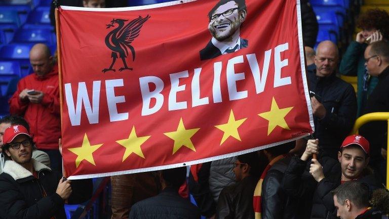 Liverpool fans with a Jurgen Klopp banner at White Hart Lane