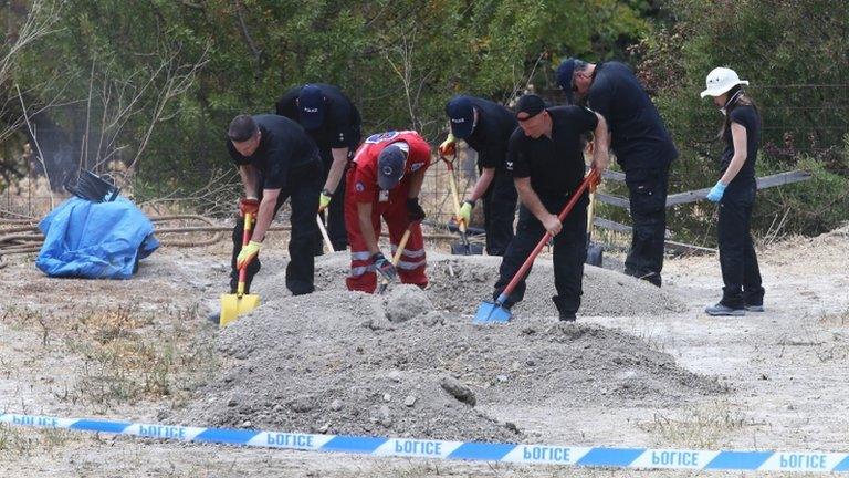 Police search officers sift through piles of earth taken from an olive grove near the scene where toddler Ben Needham went missing over 20 years ago in Kos, Greece.