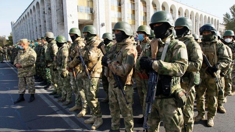 Members of Kyrgyz armed forces stand in formation in Ala-Too Square