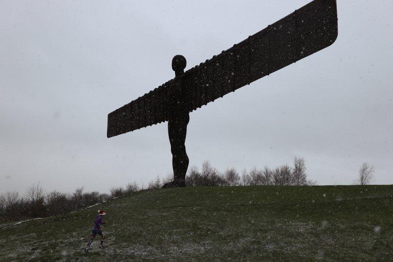 The Angel of the North in Gateshead looks like its reaching out to touch the snowflakes!