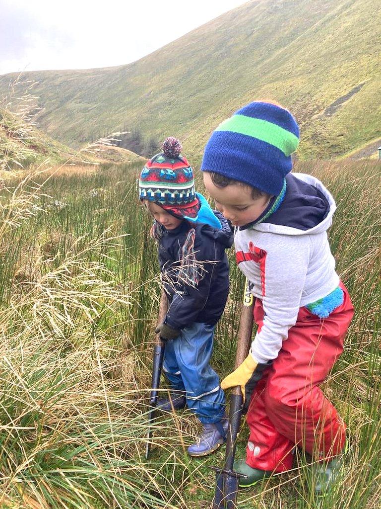 Kids planting trees