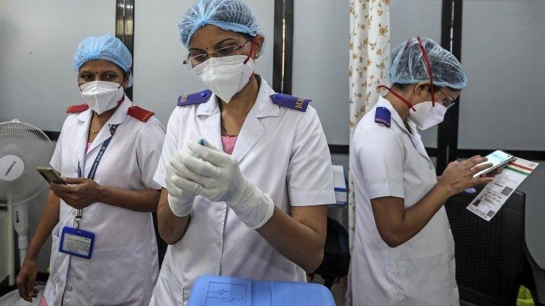 A nurse prepares a shot of COVID-19 vaccine inside a vaccination centre at Shatabdi Hospital in Mumbai, India, 01 April 2021