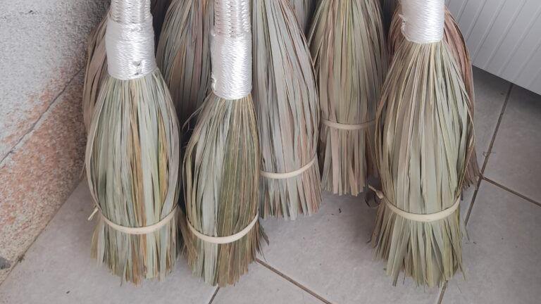 Traditional brooms made from palm leaves