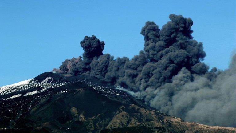 Thick black smoke from Mount Etna