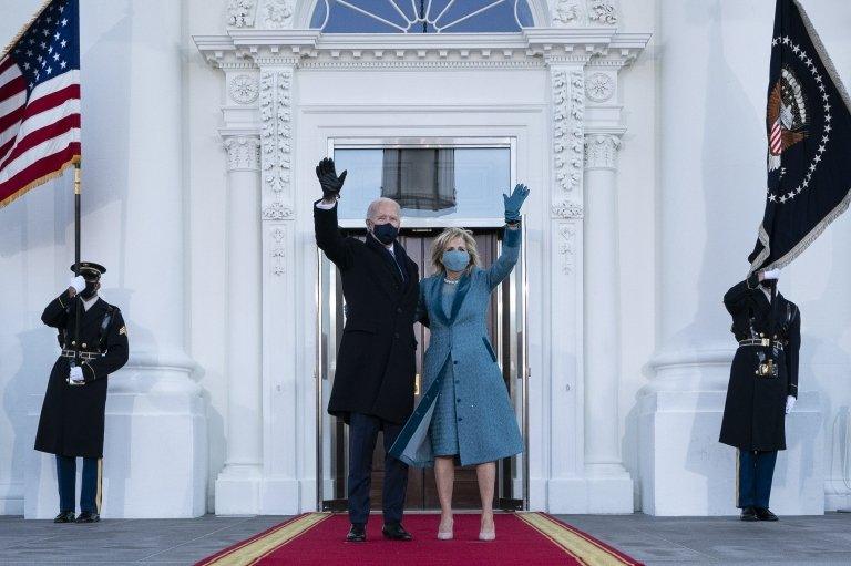 On arrival at the White House, Joe Biden and first Lady Jill Biden waved to the media and to supporters from the steps of the President's traditional home.