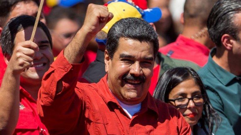 Venezuelan President Nicolas Maduro gestures to supporters during an event where he has presented his re-election candidacy before the National Electoral Council (CNE), in Caracas, Venezuela, 27 February 2018