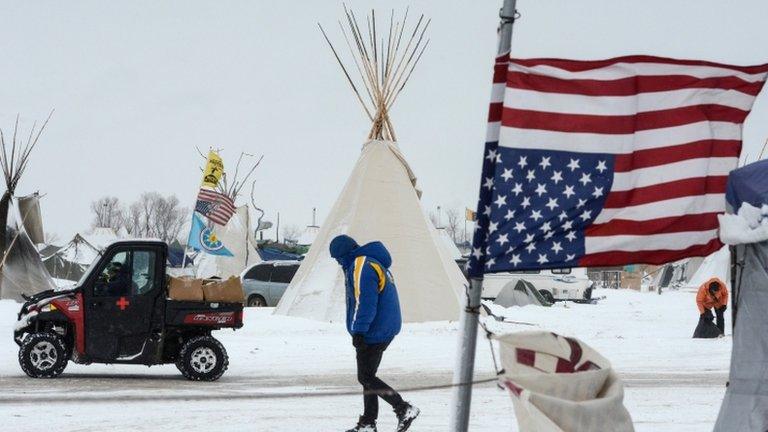 protester in snow storm