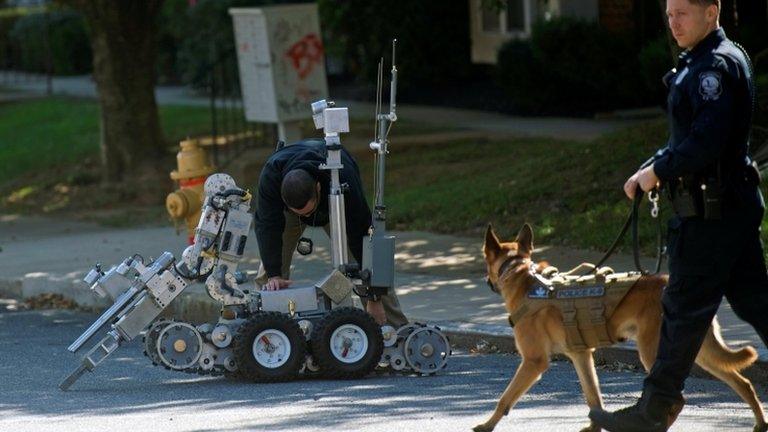 Police search a post office in Delaware