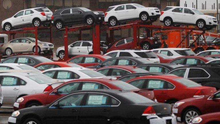 Newly built GM cars in a shipping lot near the assembly plant in Oshawa