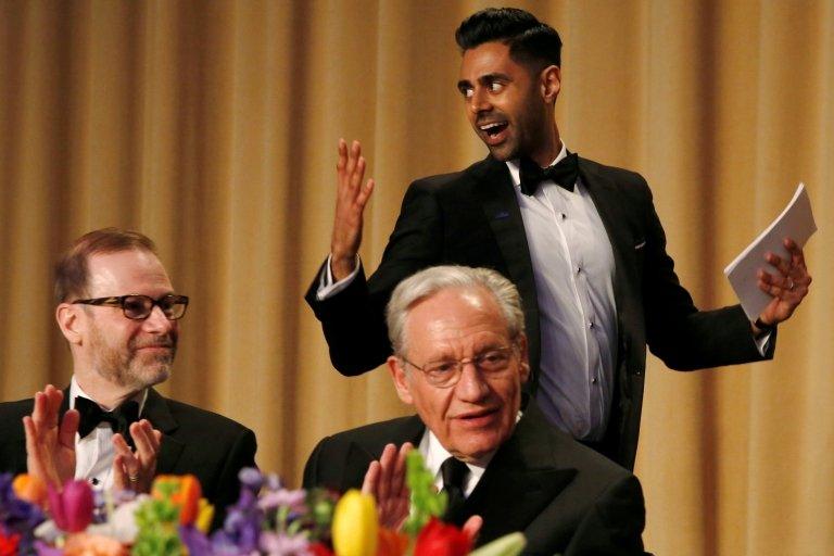 Comedian Hasan Minhaj (R) had a tough crowd in Washington Post journalist Bob Woodward (C) and Reuters Editor-in-Chief Steve Adler (L)