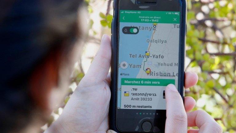 Woman checks her mobile phone in Israel (file photo)