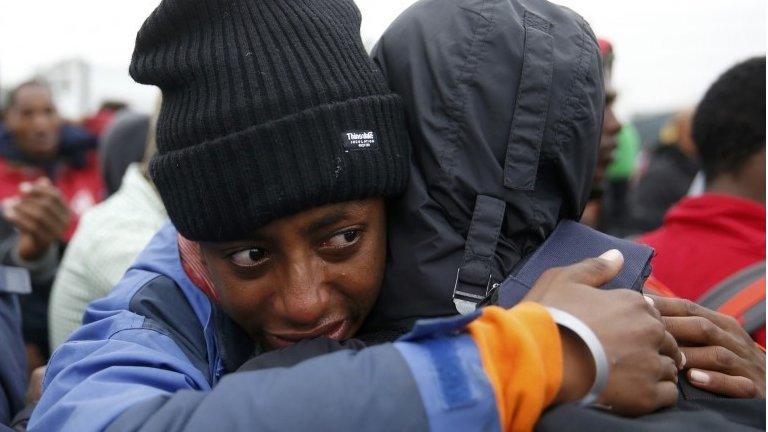 An Ethiopian man cries as he leaves the Jungle