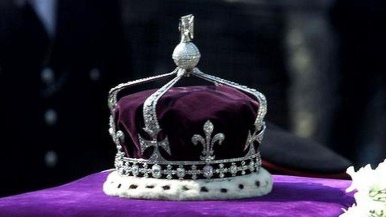 The crown of Queen Elizabeth the Queen Mother, containing the gem, lies on her coffin