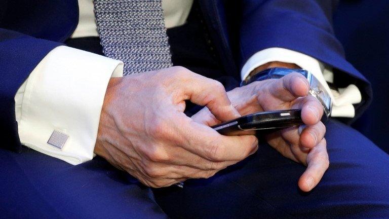 French ex-PM Manuel Valls using the phone