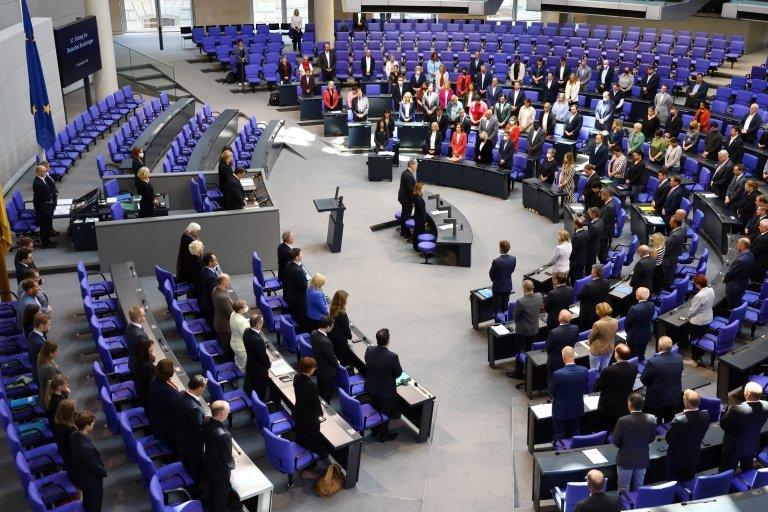 The members of the German Parliament rose for a minute's silence in tribute to the Queen