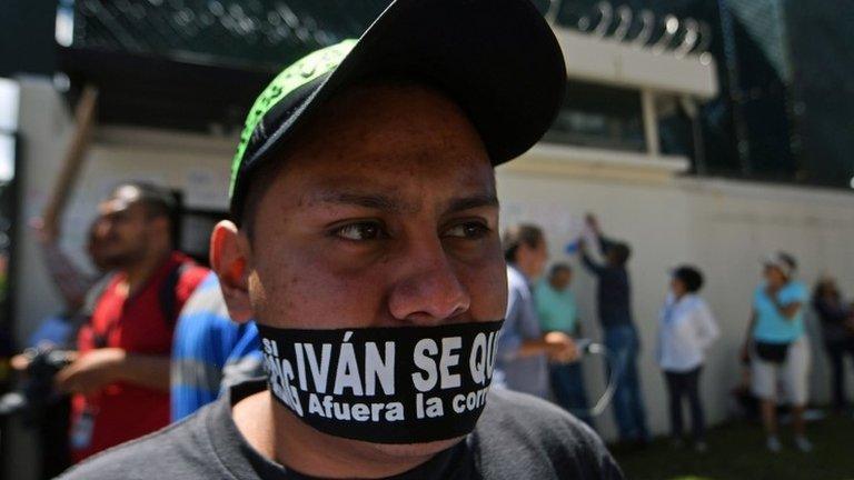 Guatemalans hold a demonstration demanding President Jimmy Morales" resignation and in support of the head of the International Commission Against Impunity in Guatemala (CICIG), 27 Aug 2017, Guatemala City