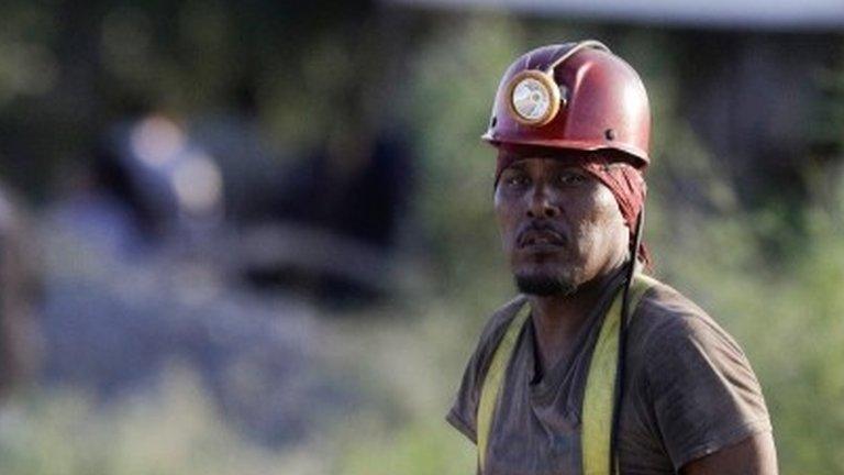 A member of the rescue team walks next to the mine shaft of a coal mine that collapsed leaving miners trapped, in Sabinas, Coahuila state, Mexico, August 7, 2022.