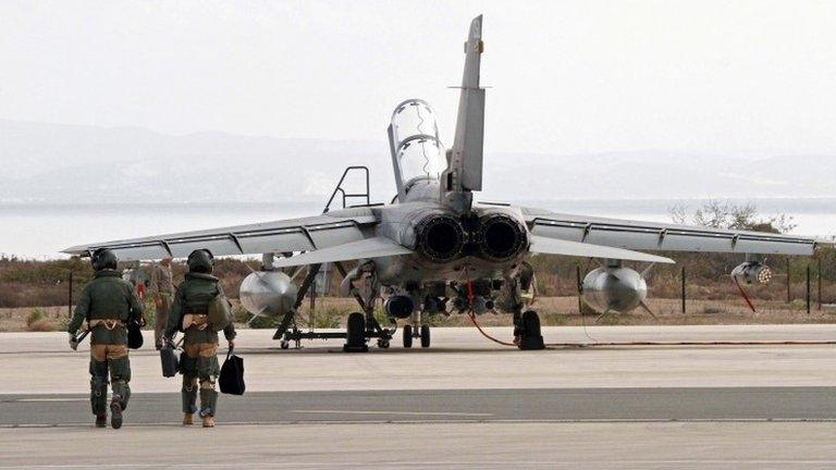 Crew walk to fighter jet at RAF Akrotiri, Cyprus