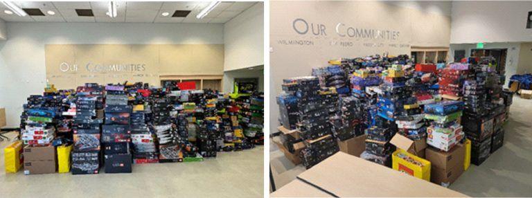 Lego sets are stacked in multiple piles inside a Los Angeles police station.