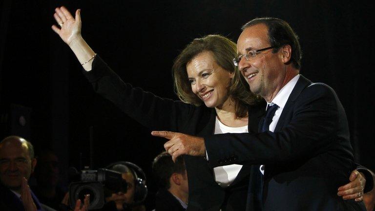 French president-elect Francois Hollande and Valerie Trierweiler greeting crowds gathered to celebrate his election victory in Bastille Square in Paris, France, 6 May 2012.