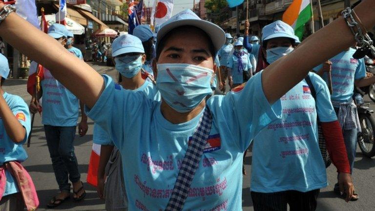 Protesters demonstrating after the death of activist Chut Wutty