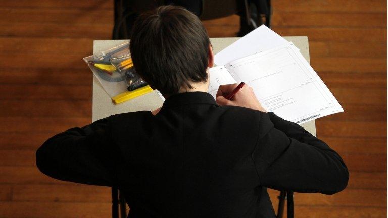 School pupil sitting exam