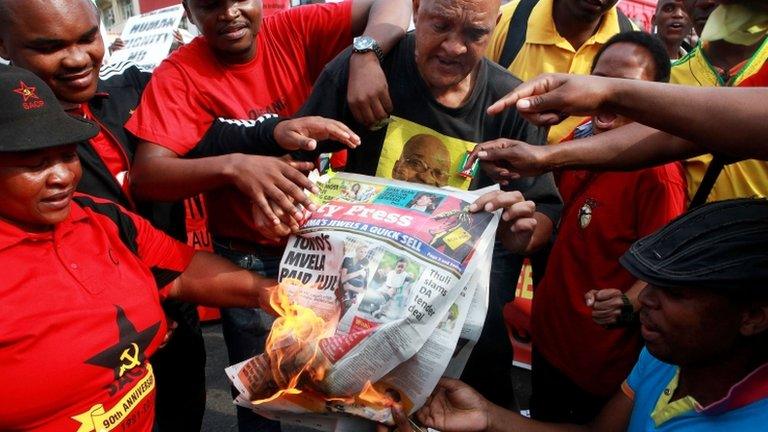 Copies of South Africa's City Press paper on fire