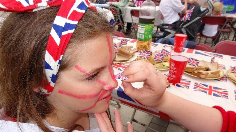 Jade Townsend, 11, from Southville in Bristol, having her face painted, at the "Big Lunch" preparations at Millennium Square in Bristol