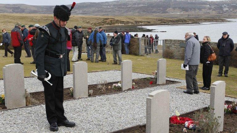 A wreath laying ceremony at the San Carlos cemetery in the Falklands