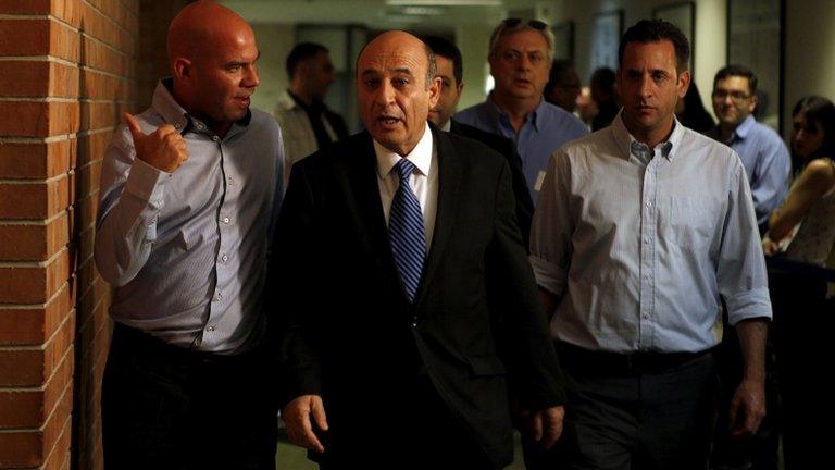 Shaul Mofaz (centre) arrives at a meeting of Kadima MPs (11 July 2012)
